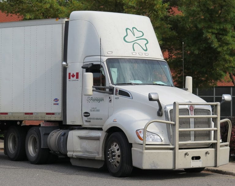 Tractor-trailer with a Canadian flag decal, parked in Sault Ste. Marie, Ontario