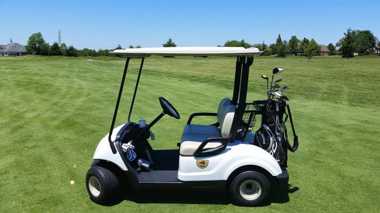 Golf cart parked on a fairway