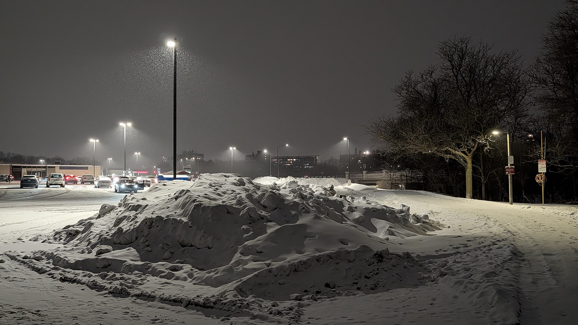 Snow-covered shopping centre parking lot