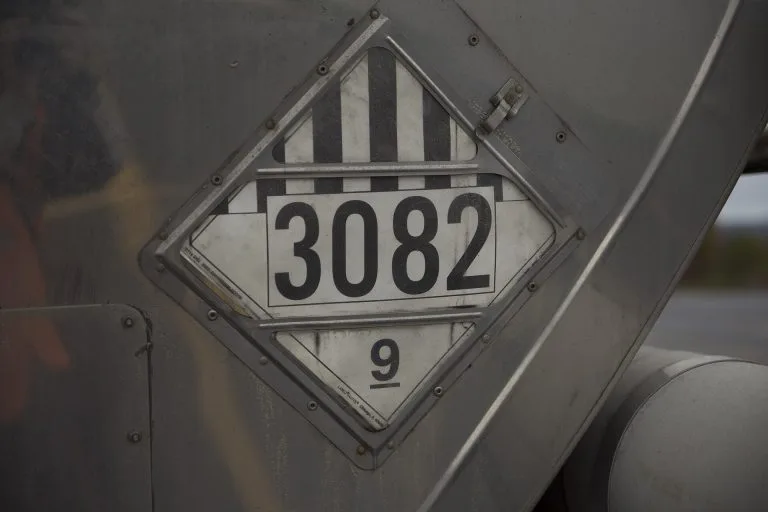 Class 9 dangerous goods placard on a tank trailer